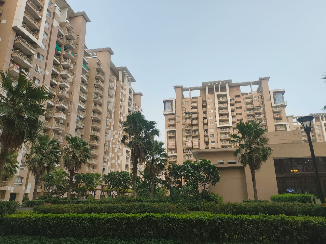 Why NRIs Should Invest in Ready-to-Move Homes in Gurgaon – Spotlight on Emaar Palm Gardens